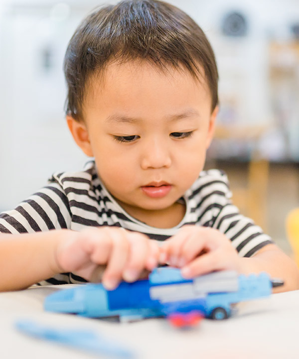 image of a boy in play therapy